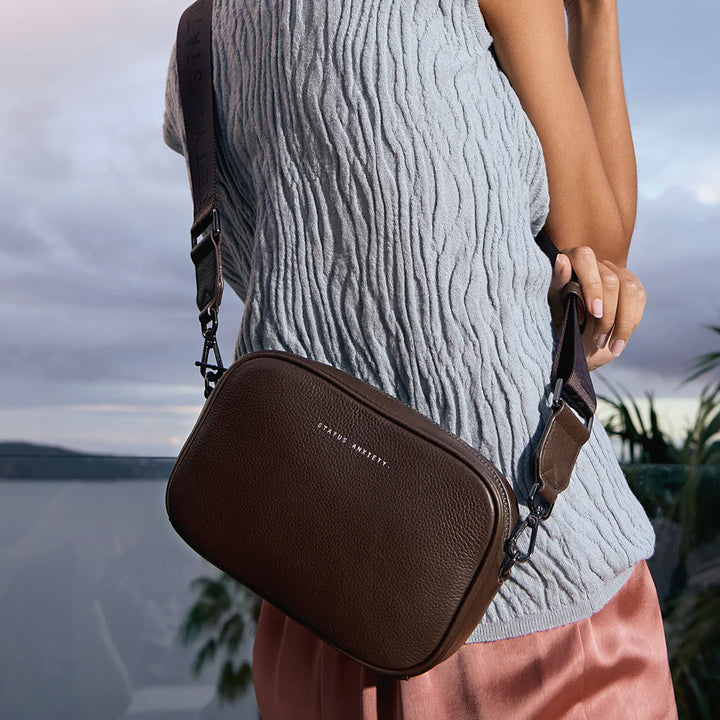STATUS ANXIETY Womens Plunder Leather Bag with Webbed Strap  - Cocoa, WOMENS BAGS & CLUTCHES, STATUS ANXIETY, Elwood 101