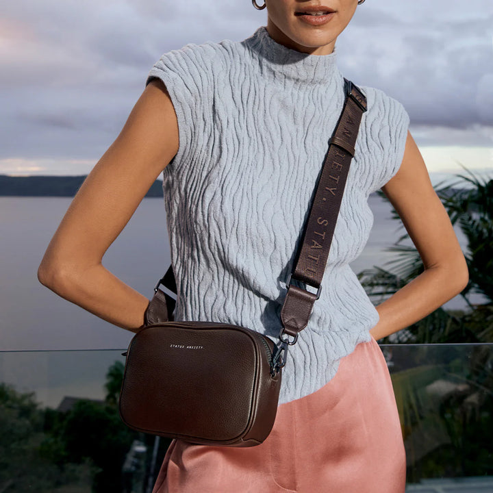 STATUS ANXIETY Womens Plunder Leather Bag with Webbed Strap  - Cocoa, WOMENS BAGS & CLUTCHES, STATUS ANXIETY, Elwood 101