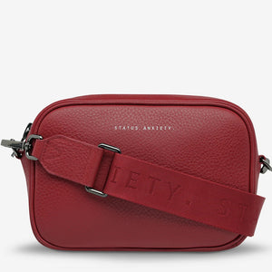 STATUS ANXIETY Womens Plunder Leather Bag with Webbed Strap - Rouge