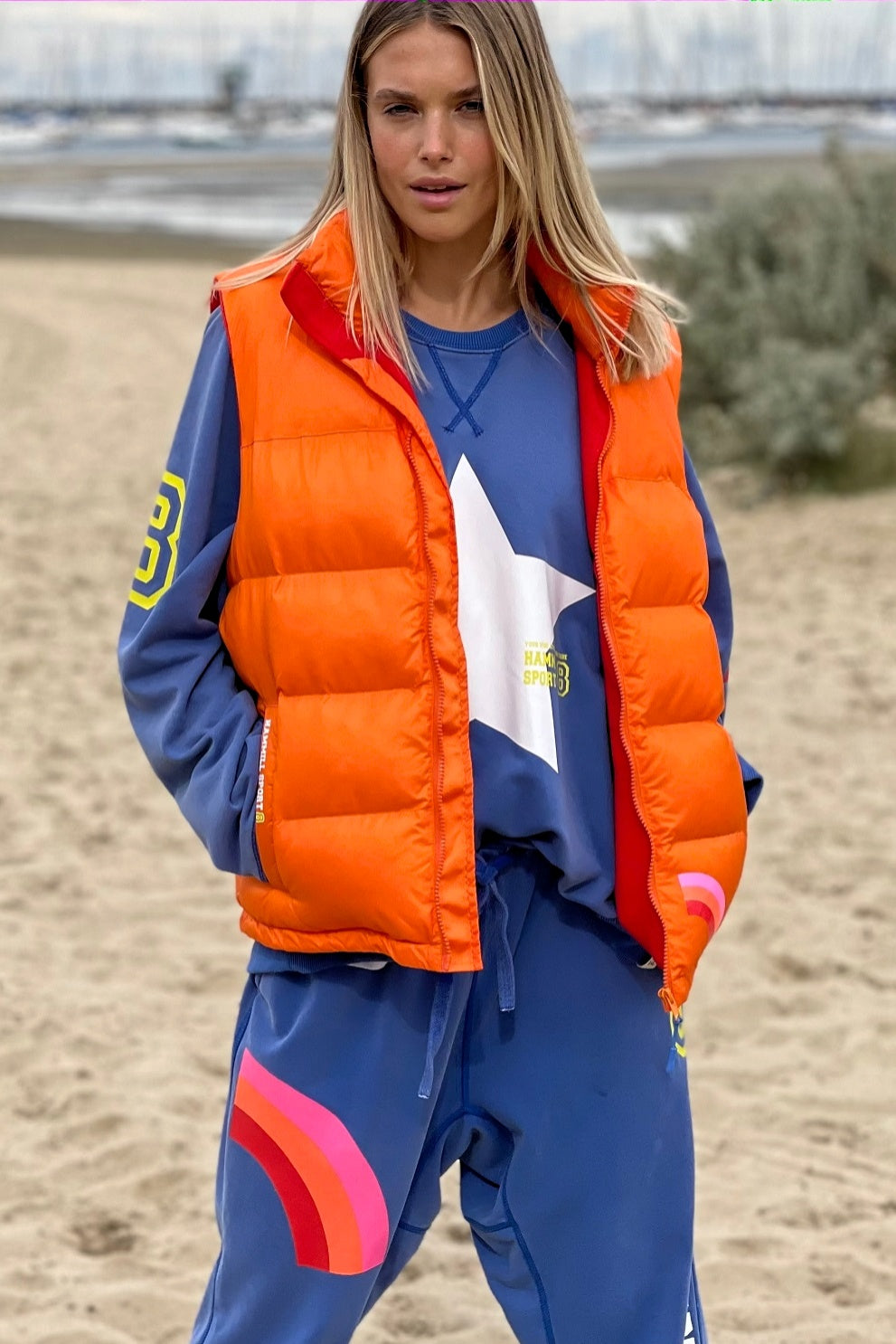 Orange puffer vest womens outlet